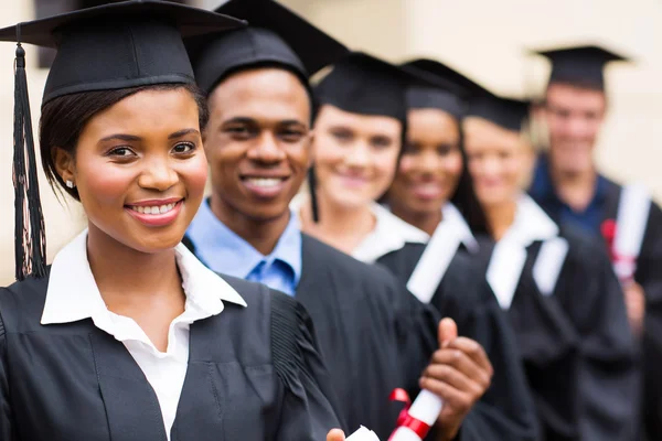 depositphotos_42486051-stock-photo-multicultural-university-graduates-standing-in